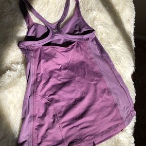 Purple Lululemon tank with cut-out back